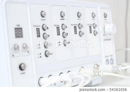 Cosmetic Multifunctional Device close-up in beauty Cosmetic Multifunctional Device close-up in beauty 54161056