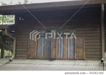 Beautiful Thai vintage style house and tropical Beautiful Thai vintage style house and tropical 54162100