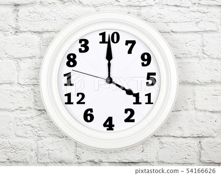 Clock with figures mixed up. Concept of disorder 54166626