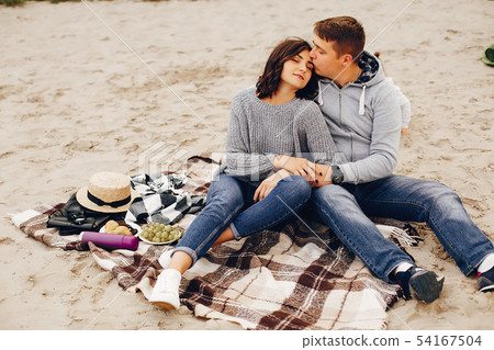 Beautiful couple spend time in a summer park 54167504