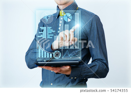 Businessman interacts with virtual screen, analyze data. Innovation Graphs Interfaces. 54174355