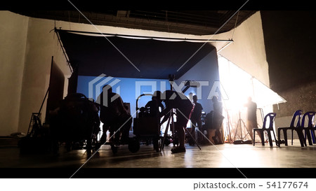 Behind the shooting production crew team and 54177674