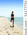 girl running seaside 54177793