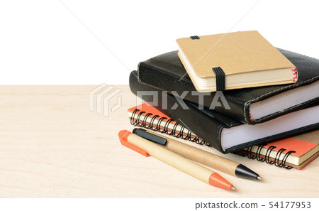 Notebooks and pens on wooden table 54177953