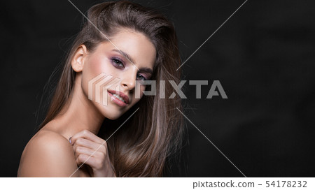 Fashion studio shot of beautiful smiley young woman with make-up. Close-up portrait. Fashion studio shot of beautiful smiley young woman with make-up. Close-up portrait. 54178232