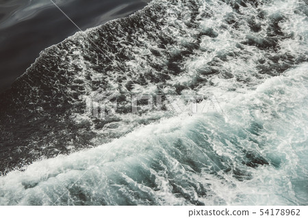 Aerial view to ocean waves. Blue water background Aerial view to ocean waves. Blue water background 54178962