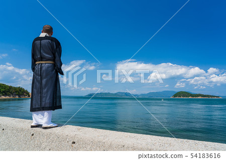 Blue sky and monks Blue sky and monks 54183616