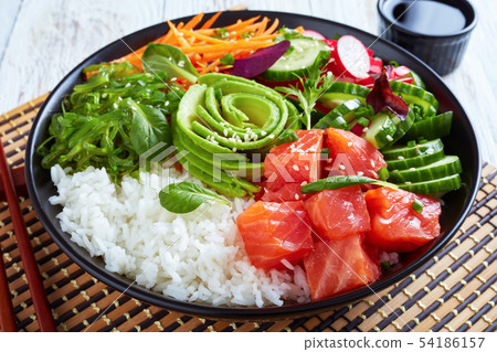 Raw Organic Ahi salmon Poke Bowl, top view Raw Organic Ahi salmon Poke Bowl, top view 54186157