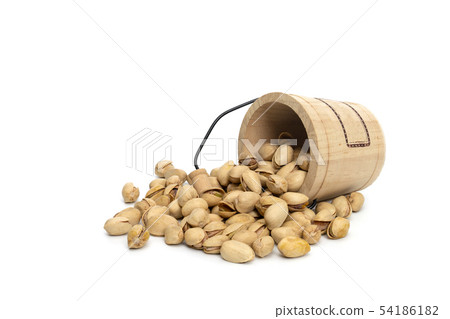 Closeup pistachios nut dry roasted and salted in a Closeup pistachios nut dry roasted and salted in a 54186182