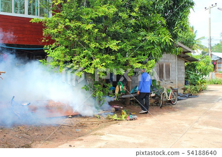 Staff are using fogging machine to spray fogging t 54188640