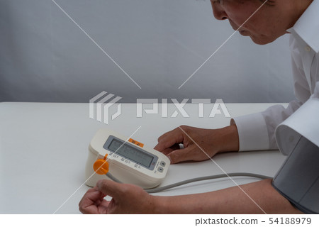 Senior man measuring blood pressure 54188979