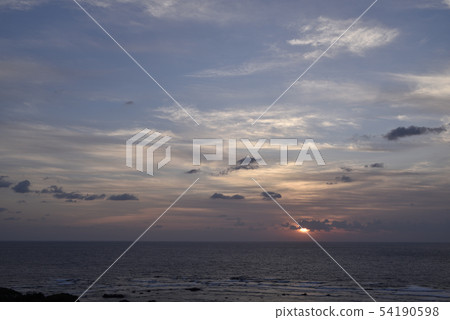 A rising sun rising from the abyss 54190598