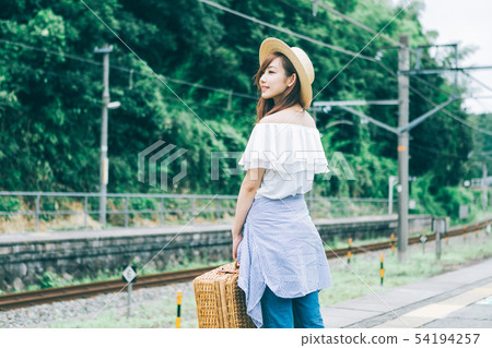 Travel image of a young woman Travel image of a young woman 54194257
