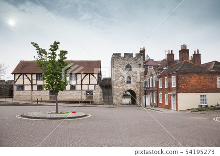 Southampton street with old stone tower Southampton street with old stone tower 54195273