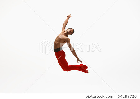 Young graceful male ballet dancer dancing on white studio background Young graceful male ballet dancer dancing on white studio background 54195726