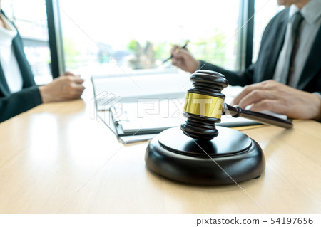 Judge or lawyer talking  with team 54197656