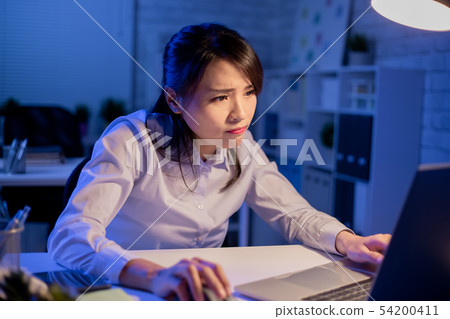 woman overtime work woman overtime work 54200411