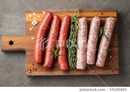 Assorted fresh raw sausages. 54200865