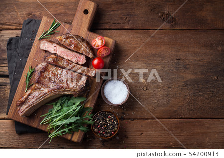 Grilled cowboy beef steak. Grilled cowboy beef steak. 54200913