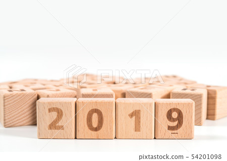 word 2019 on wood cube dices on white background. 54201098