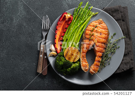 Tasty and healthy salmon steak. Tasty and healthy salmon steak. 54201127