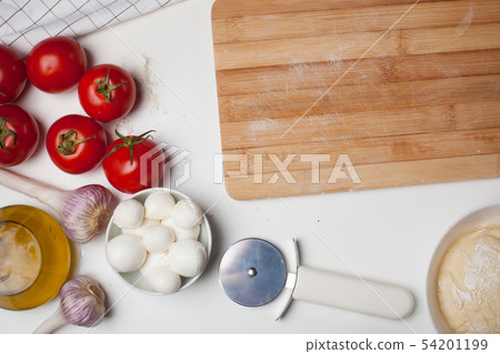 Wooden cutting Board with ingredients. Wooden cutting Board with ingredients. 54201199