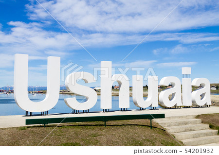 Ushuaia landmark. Ushuaia written in white letters 54201932