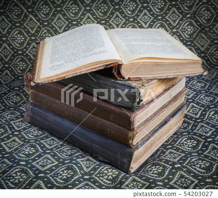 composition of old books in a stack composition of old books in a stack 54203027