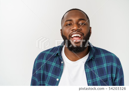 Close up portrait of a handsome young man smiling. Close up portrait of a handsome young man smiling. 54203326