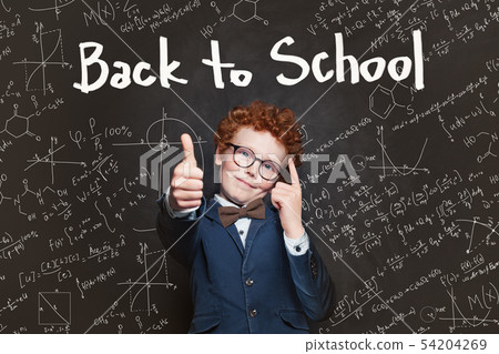 Clever boy student with Back to school text Clever boy student with Back to school text 54204269
