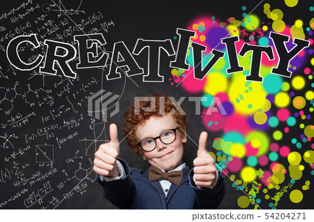 Smiling child boy showing thumb up on background Smiling child boy showing thumb up on background 54204271