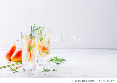 Summer drinks, rosemary pear cocktails. Summer drinks, rosemary pear cocktails. 54205057
