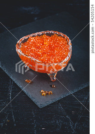 Salmon caviar in glass plate Salmon caviar in glass plate 54205154