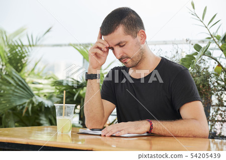 Businessman working in cafe Businessman working in cafe 54205439
