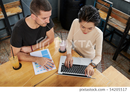 Business people working with laptop Business people working with laptop 54205517