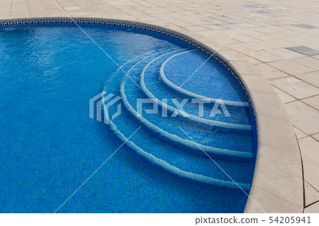 Modern pool with round steps. Close up. 54205941