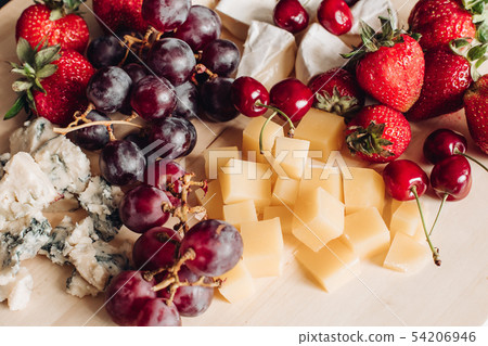 Assorted fruit and cheese plate.Close-up of Assorted fruit and cheese plate.Close-up of 54206946