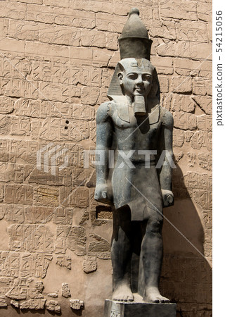 Statues in front of Entrance to Luxor Temple, Ancient Egyptian temple complex east bank Nile River Statues in front of Entrance to Luxor Temple, Ancient Egyptian temple complex east bank Nile River 54215056
