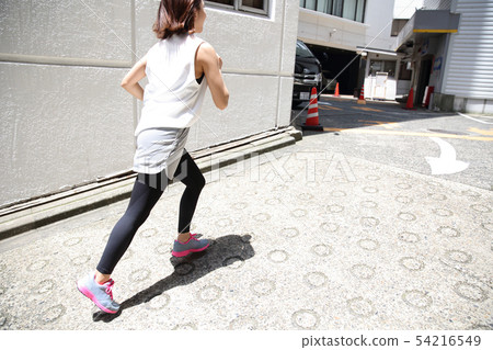 Woman jogging 54216549