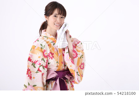 Young woman wearing a yukata Young woman wearing a yukata 54218100