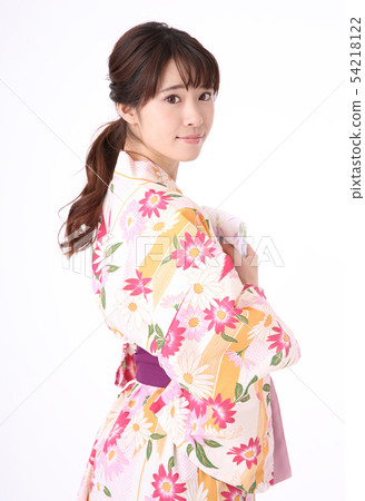 Young woman wearing a yukata Young woman wearing a yukata 54218122