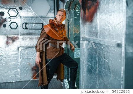 Space traveler looks out of the teleport, shuttle Space traveler looks out of the teleport, shuttle 54222995