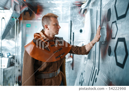 Space scientist holds wires at the control panel Space scientist holds wires at the control panel 54222998