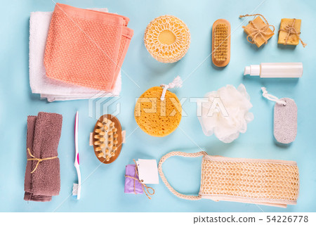 Scrub peeling brush body scrubber massager loofah bar of soap on blue Scrub peeling brush body scrubber massager loofah bar of soap on blue 54226778