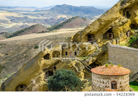 David Gareja Monastery Complex on the Georgia a Azerbaijan border,red towers, colourful desert hills 54228369