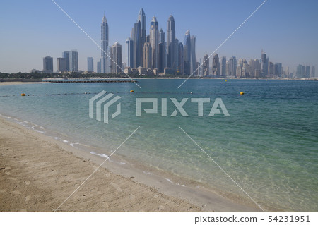 Dubai skyscrapers and beach Dubai skyscrapers and beach 54231951
