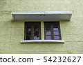 glass window on stone wall 54232627
