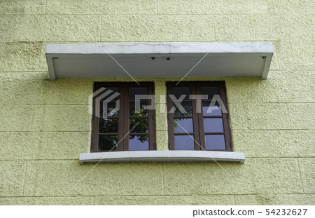 glass window on stone wall glass window on stone wall 54232627