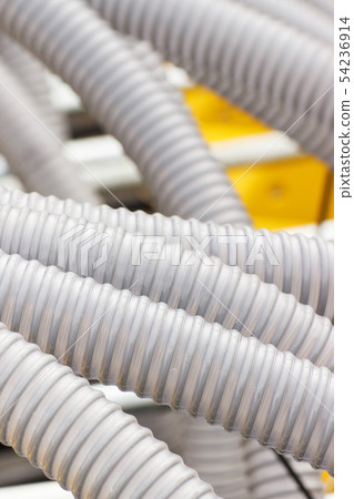 Plastic corrugated pipes in machine 54236914