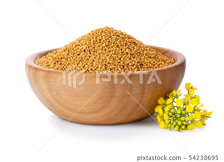 mustard seeds in wooden bowl mustard seeds in wooden bowl 54238695